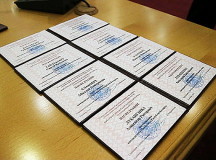 Четыре удостоверения кандидатов в президенты Беларуси. © Фото - БЕЛТА