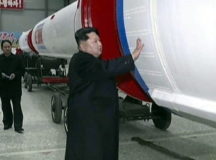 Глава КНДР Чим Чен Ын и баллистическая ракета. © Фото ЦТАК