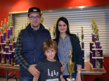 Юный чемпион Егор Гринько с родителями. © Фото из семейного архива